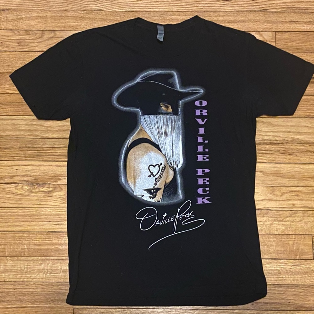 ORVILLE PECK black t-shirt.